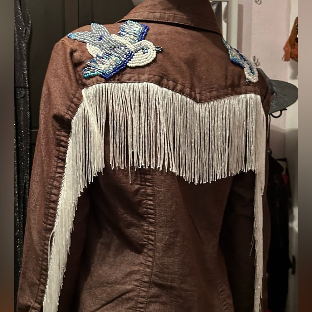 # 123    Fabulous handcrafted bird jacket